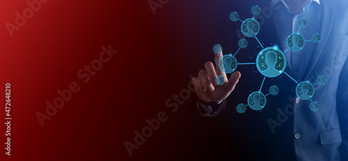 Businessman holding on hand icon of user man,woman low poly polygon style. Internet icons interface foreground. global network media concept.