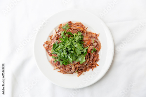 onion salad with parsley on white background