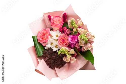 Fototapeta Naklejka Na Ścianę i Meble -  Bouquet of  soft pink flowers in pink wrapping paper.