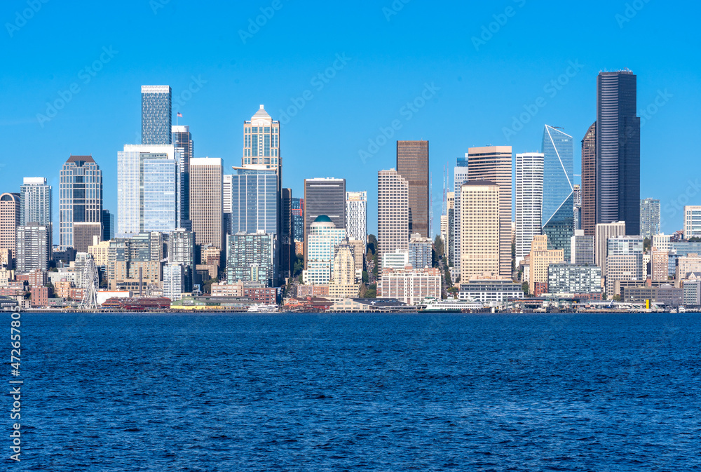 Seattle, WA - USA - Sept. 23, 2021: Horizontal view of Seattle's downtown skyline and waterfront; highlighting the Columbia Center, F5 Tower, Washington Mutual Tower, and Qualtrics Tower.