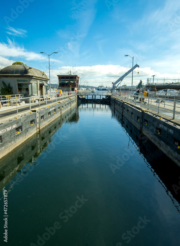 Seattle, WA - USA - Sept. 23, 2021: View of the Hiram M. Chittenden Locks, or Ballard Locks, a complex of locks at the west end of Salmon Bay, in Seattle, Washington's Lake Washington Ship Canal © Brian