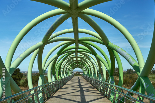 Green metal pedestrian bridge photo