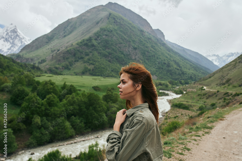 Fototapeta premium woman hiker mountains landscape travel freedom fresh air