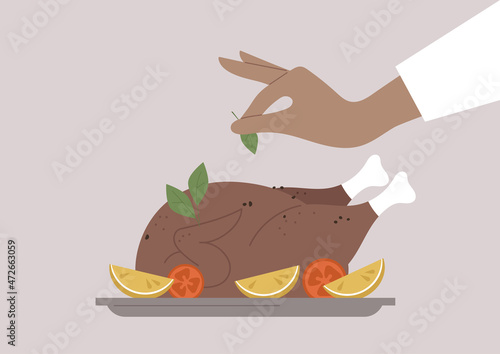 A chef serving a baked chicken with vegetables and herbs