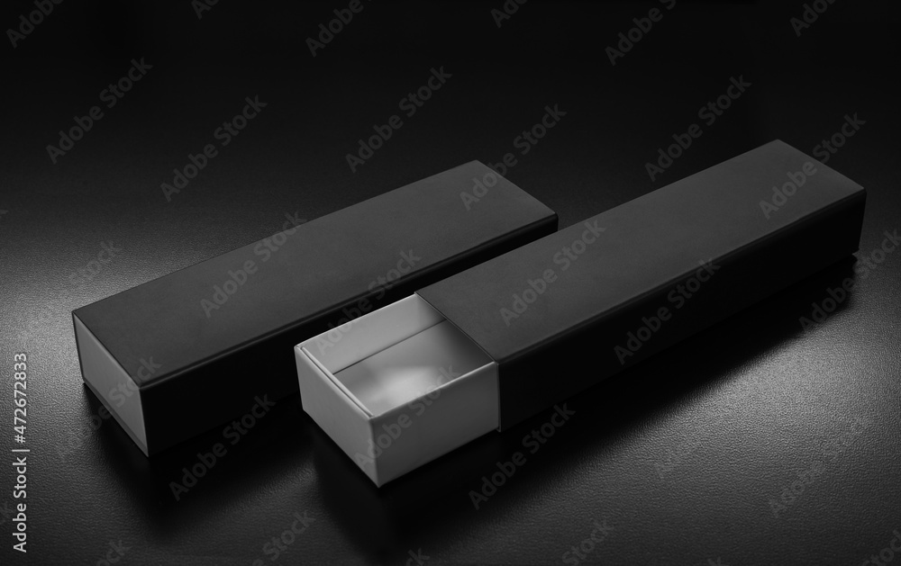 Pair of luxurious black boxes with copy space Pair of luxurious black boxes with copy space