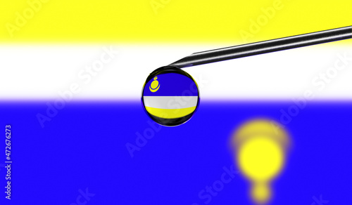 Vaccine syringe with drop on needle against national flag of Buryatia background. Medical concept vaccination. Coronavirus Sars-Cov-2 pandemic protection. National safety idea.