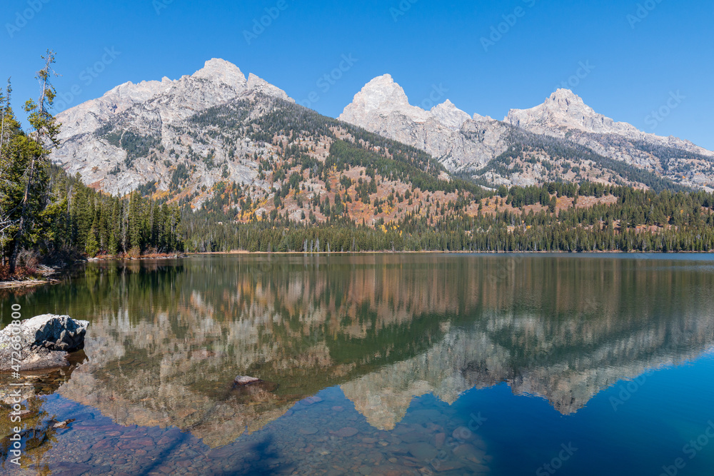 Scenic Reflection Landscape of the Tetons in Taggart Lake Wyoming in Autumn