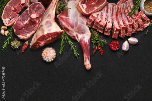 Assortment of various raw lamb cut parts photo