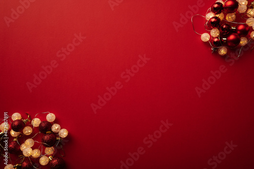 Christmas decoration card and illustration for Holliday red background with pinecones lights for corporate or personal invitations  © Mauricio