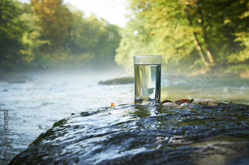 Flask with clear river water.