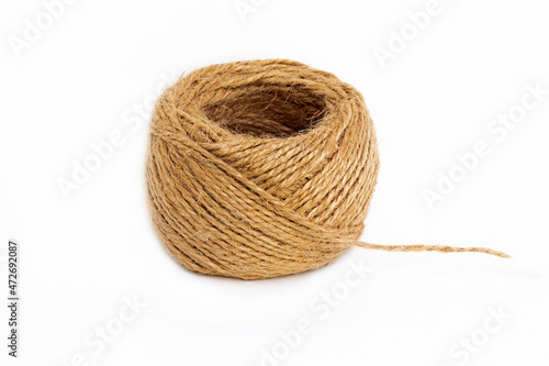 Close-Up of skein of jute twine on the white background.