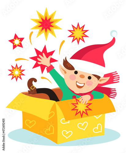 Christmas elf sitting in opened present box. Surprise holiday gift