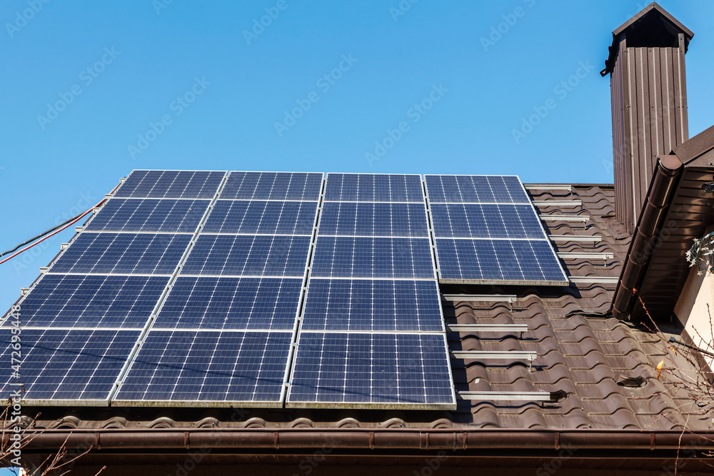 Fototapeta premium Solar panels on house roof
