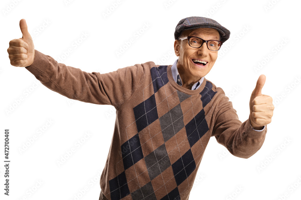Cheerful elderly man with a hat and jumper showing thumbs up Cheerful elderly man with a hat and jumper showing thumbs up