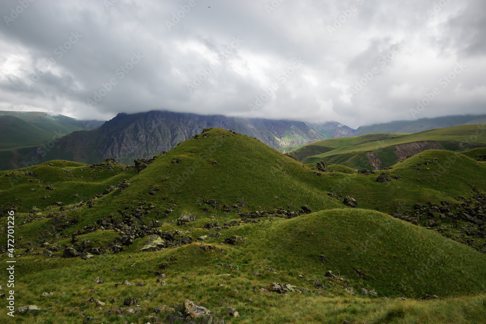 High, beautiful mountains in the Elbrus region. Unusual landscape and fantastic scenery. Beautiful mountain landscape in Kabardino-Balkaria, Russia High, beautiful mountains in the Elbrus region. Unusual landscape and fantastic scenery. Beautiful mountain landscape in Kabardino-Balkaria, Russia