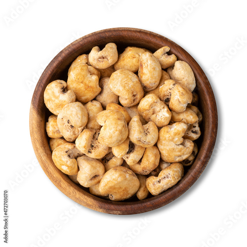 Canjica, hominy or white corn popcorn, sweet popcorn in a bowl isolated over white background