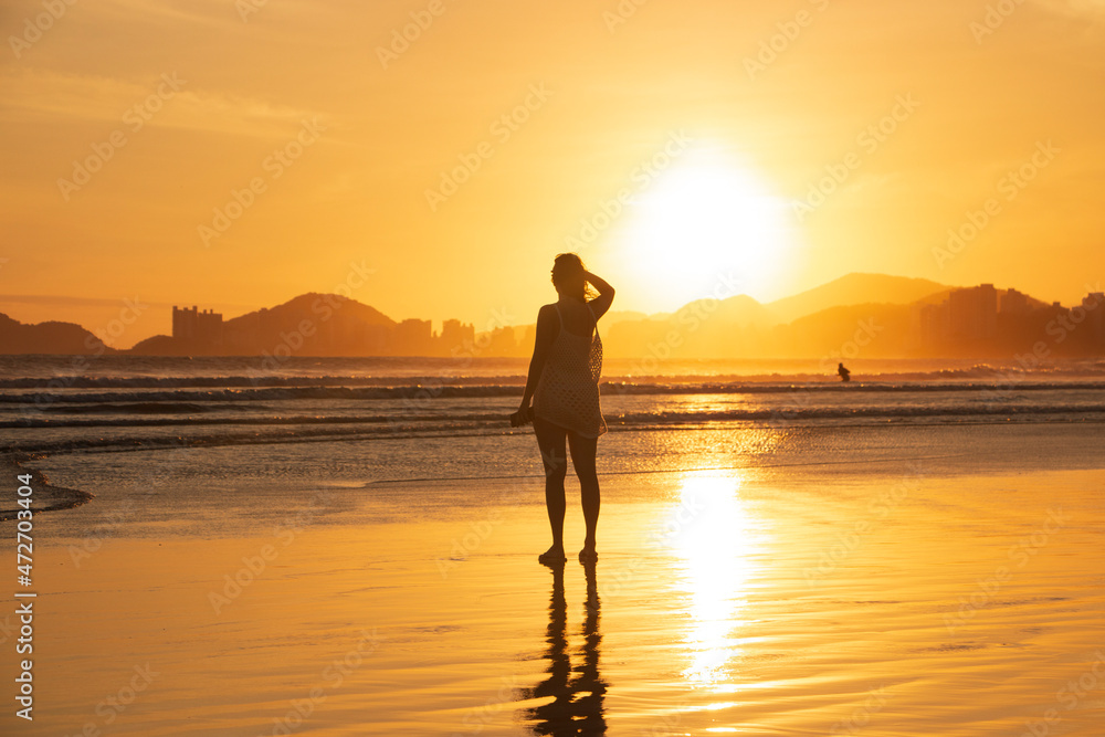 woman in beach sunset 