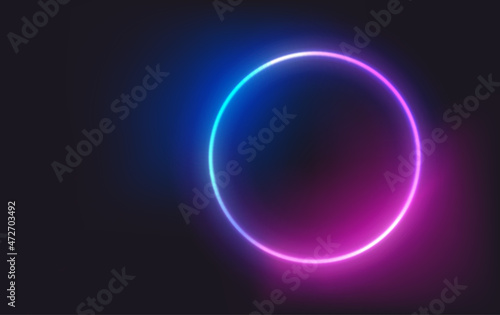 Circle neon glowing frame on dark background. Trendy color vivid gradient. Template for design