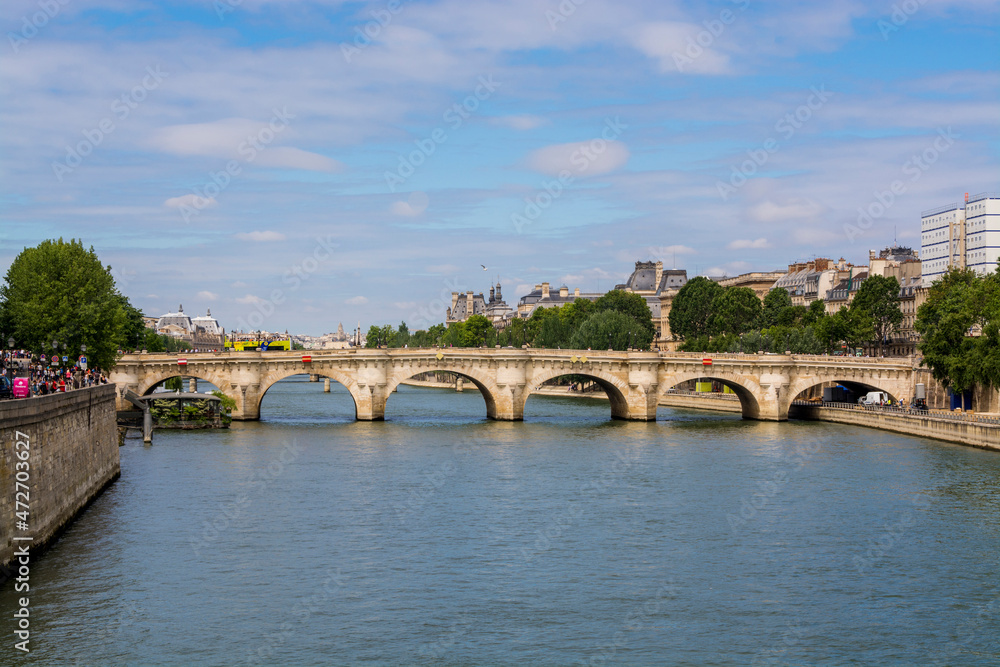 Pont Neuf Bridge over the Seine with the Louvre behind, Paris, France.