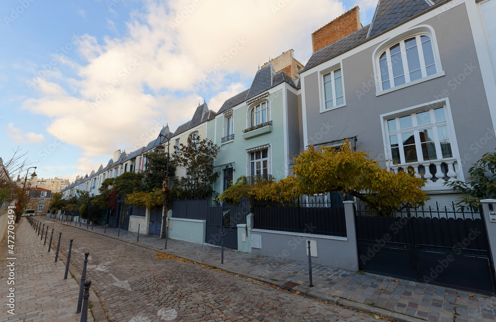 Colorful houses at Dieulafoy street in the 13th District is one of the prettiest residential streets in Paris. France.