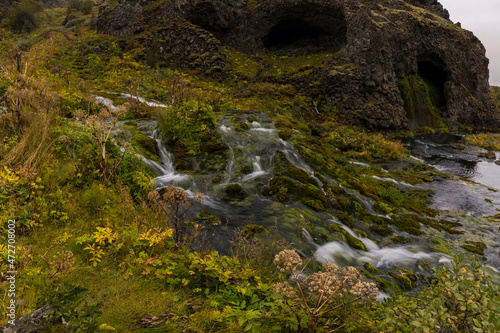 Europe, Iceland. View of Gjain waterfalls in a tranquil and scenic valley of the southern highlands.