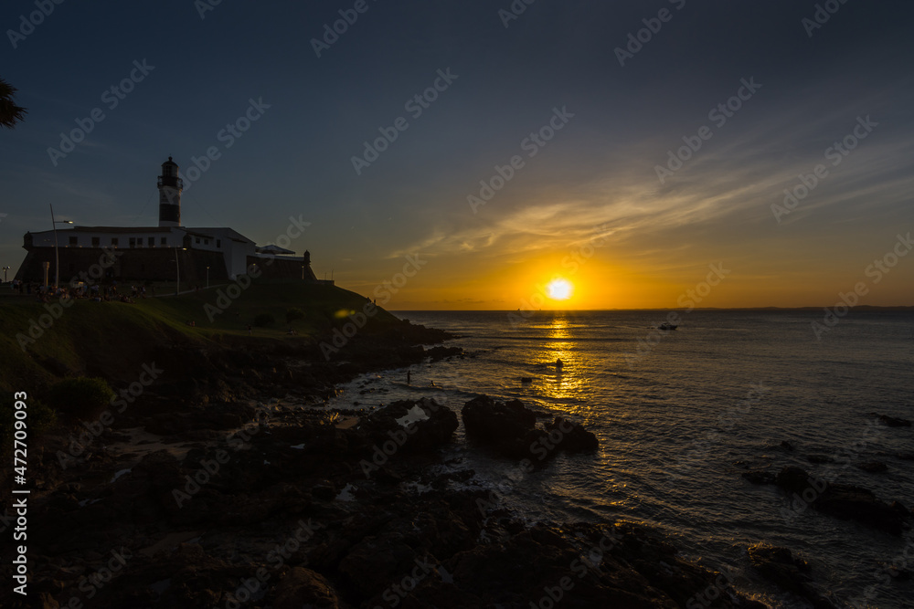 Beautiful sunset seen at Barra Lighthouse (Farol da Barra) - Salvador, Bahia, Brazil