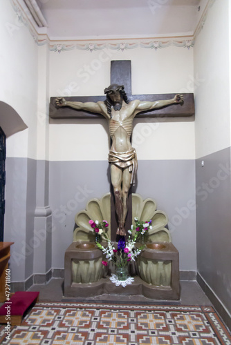 Sokolka, POLAND - September 24, 2021: St. Anthony's Church in Sokolka, Poland, site of the Eucharistic miracle. A characteristic cross with water bottles photo