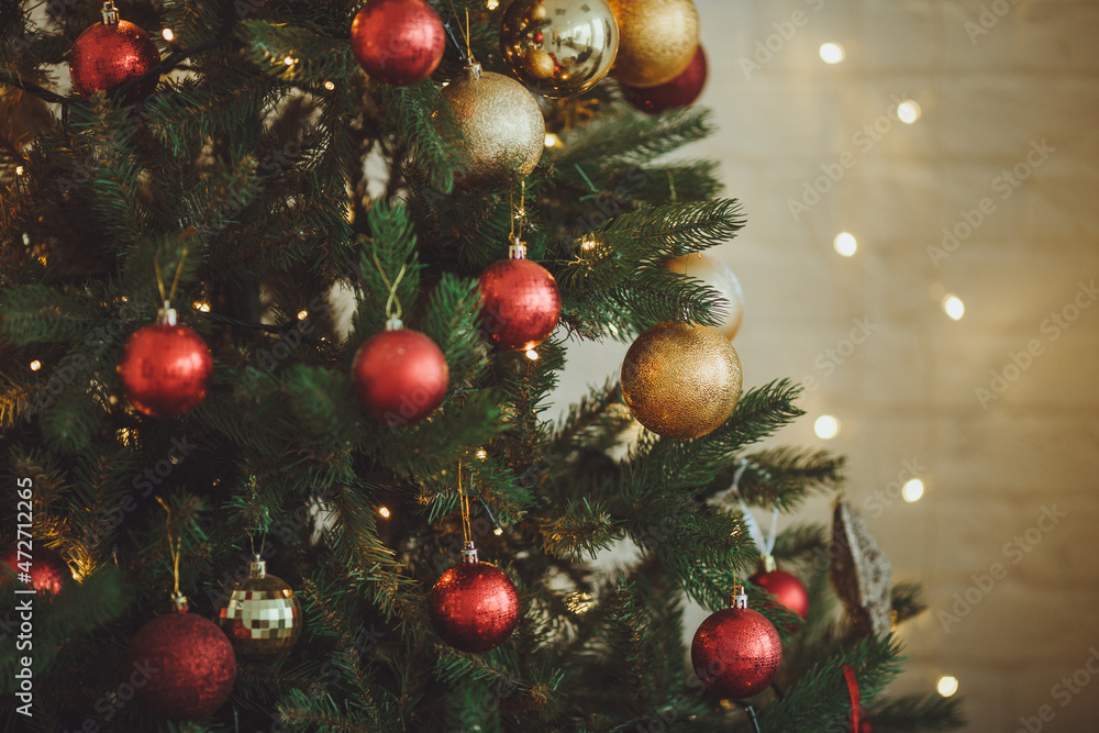 Christmas background. Christmas tree with toys and garlands.