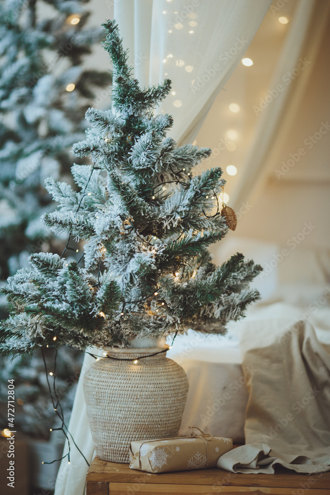 Christmas background. Christmas tree with toys and garlands.