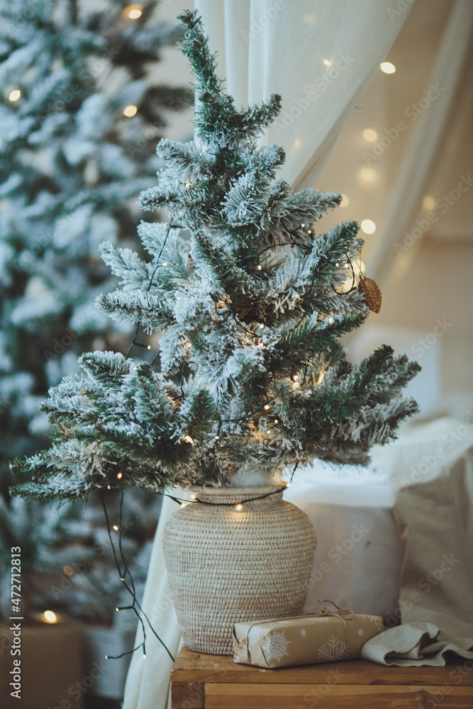 Christmas background. Christmas tree with toys and garlands.