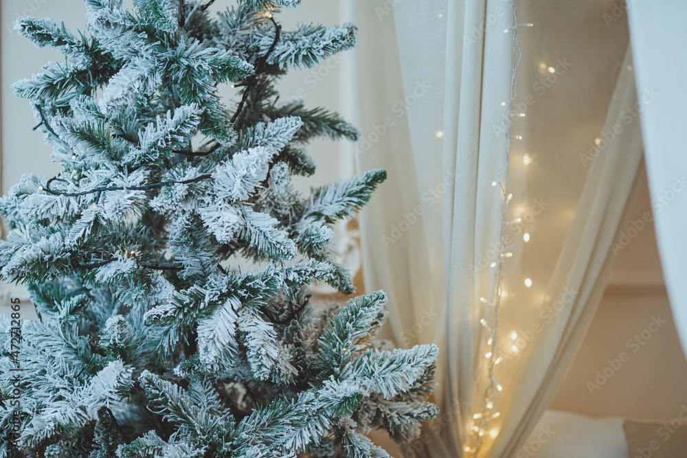 Christmas background. Christmas tree with toys and garlands.