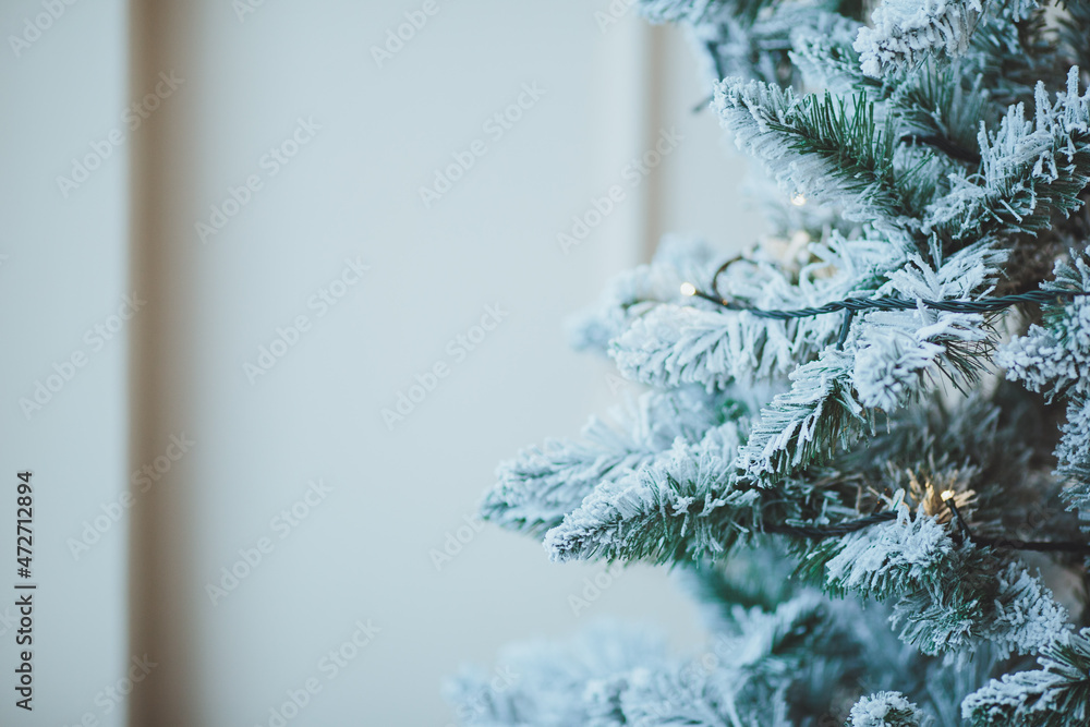 Christmas background. Christmas tree with toys and garlands.