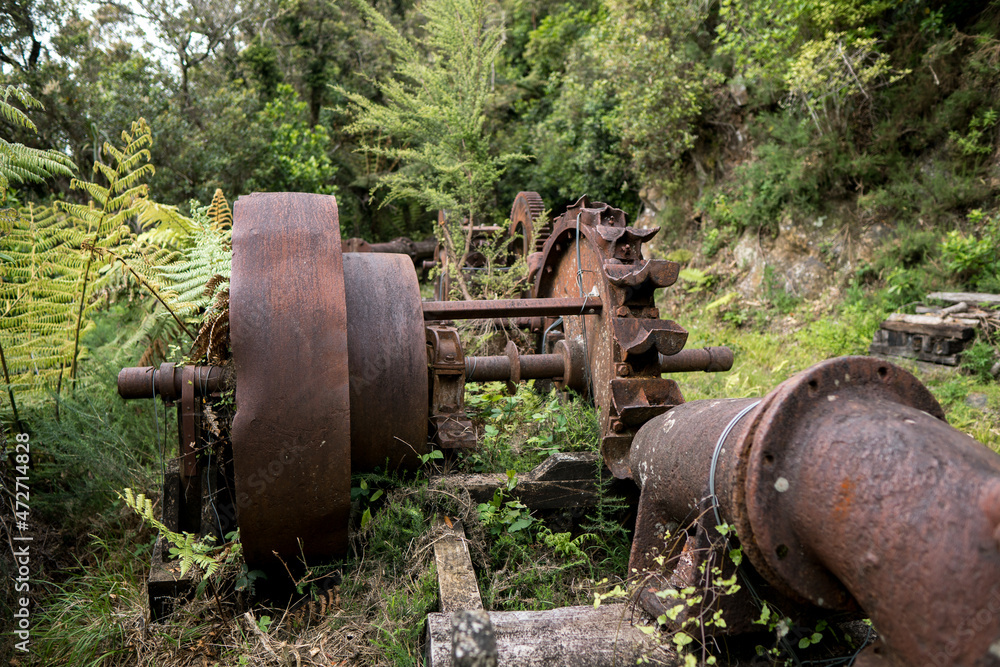 Abandoned mining equipment, Te Aroha Mountain Gold Mining Walking Track, New Zealand Abandoned mining equipment, Te Aroha Mountain Gold Mining Walking Track, New Zealand