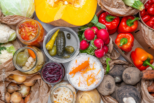 Homemade fermented in glass jars, pickled food healthy vegetables, fruit harvest. Winter fermented and canning superfood concept. Probiotics, enzymes, nutritiion veggy preservation. Selective focus