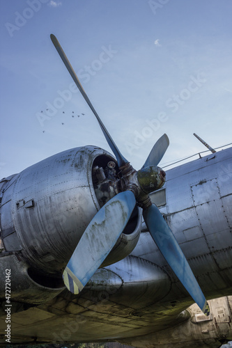 Propeller and engine of an old airplane IL-14. Abandoned plane exterior.