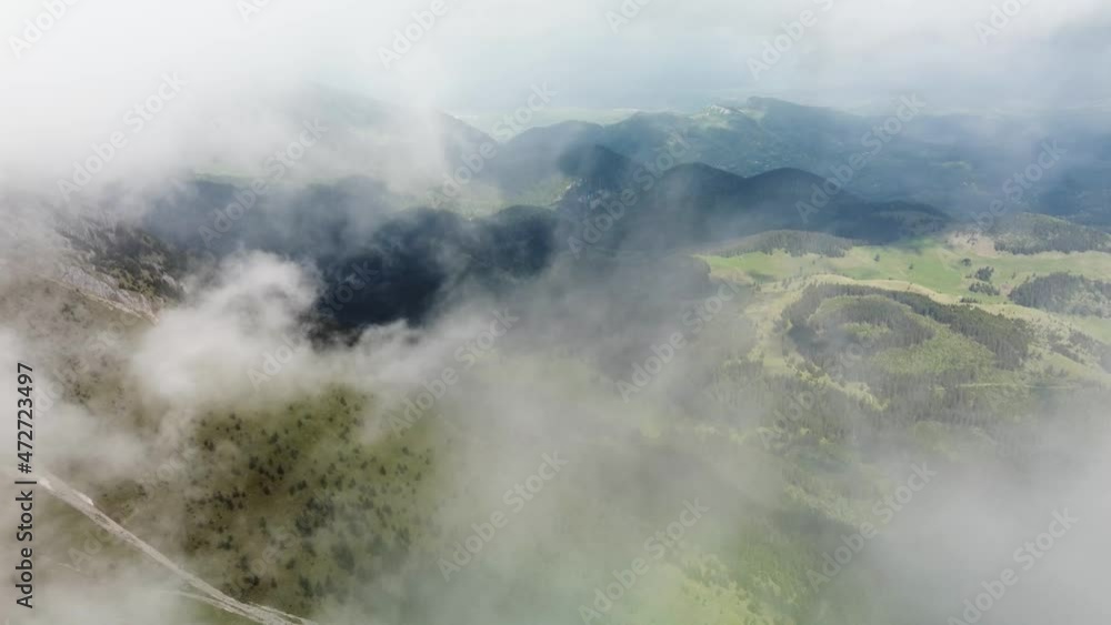 Aerial view of foggy and cloudy Piatra Craiului mountains national park in Romania Aerial view of foggy and cloudy Piatra Craiului mountains national park in Romania