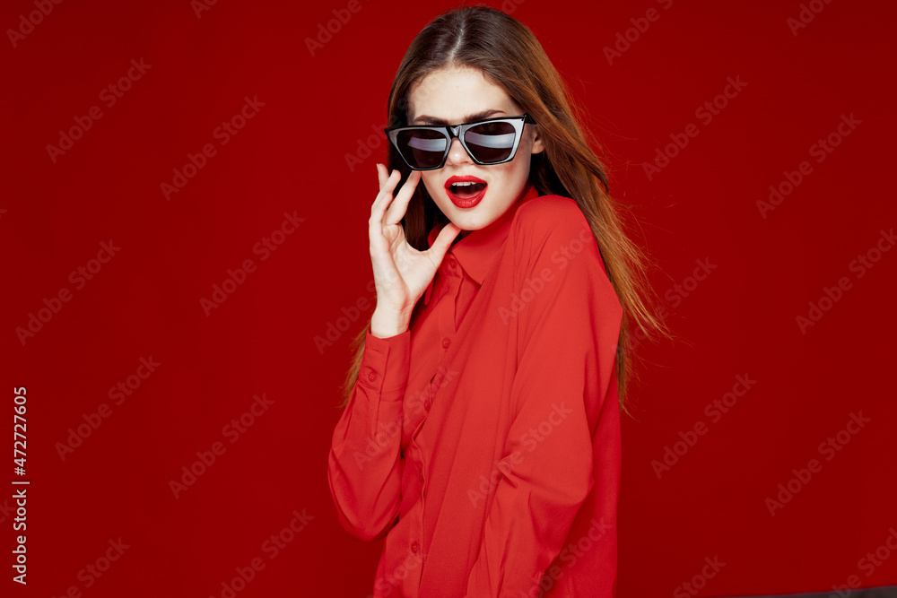 glamorous woman wearing sunglasses red shirt hairstyle model