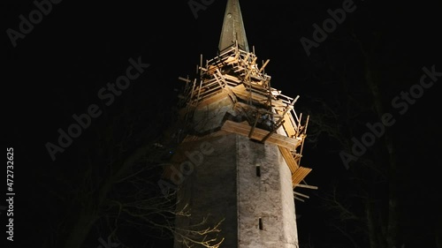 The roof of the church being fixed and still under construction in Estonia photo