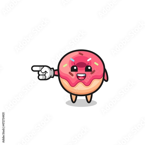 doughnut cartoon with pointing left gesture