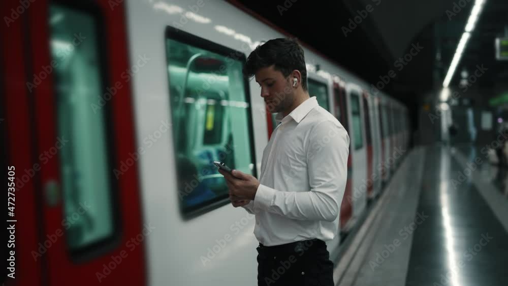 Male manager preparing to ride train Male manager preparing to ride train