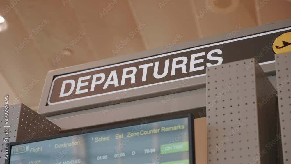 Close up of a departures sign at the airport terminal. Travel destination concept. Close up of a departures sign at the airport terminal. Travel destination concept.