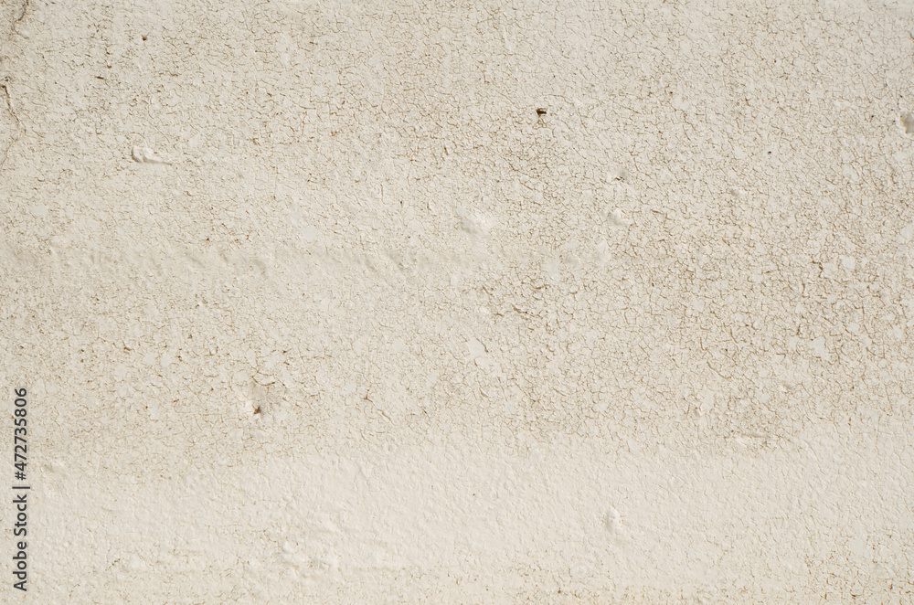 Old weathered concrete with cracked paint. Grunge texture background. Old weathered concrete with cracked paint. Grunge texture background.