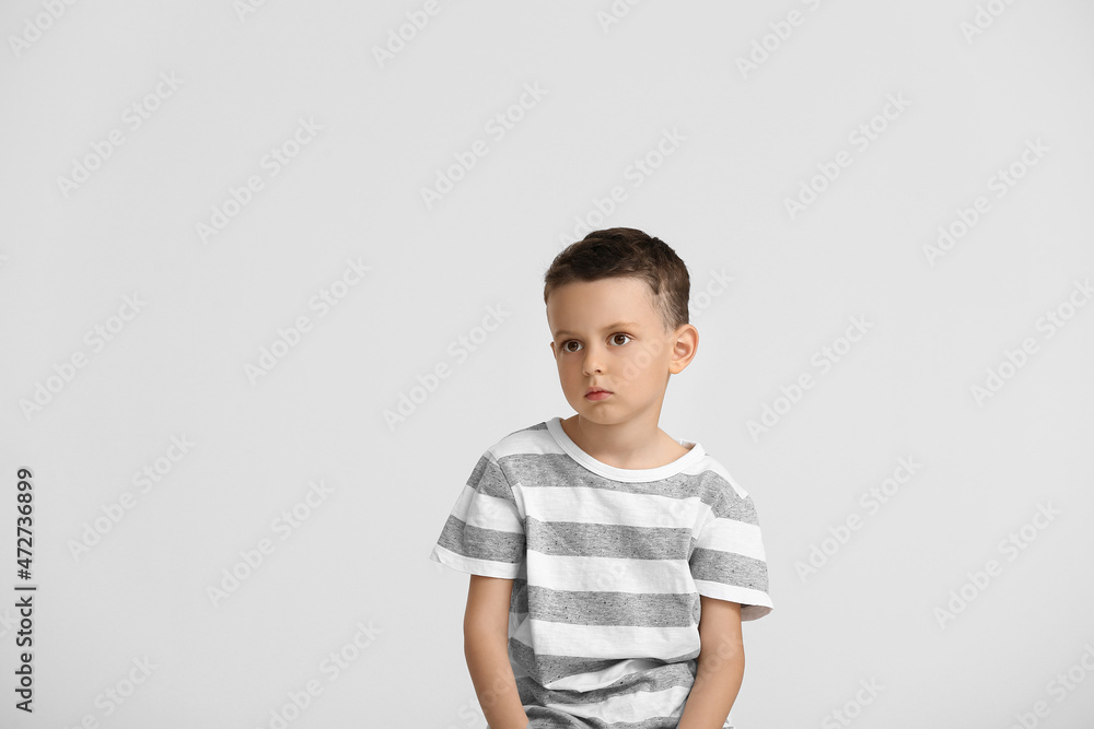 Portrait of cute little boy on light background Portrait of cute little boy on light background