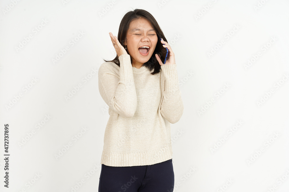 Talking on the phone and excited of Beautiful Asian Woman Isolated On White Background Talking on the phone and excited of Beautiful Asian Woman Isolated On White Background