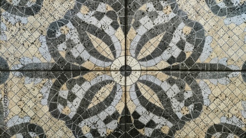 Photography detail of a mosaic of a stone