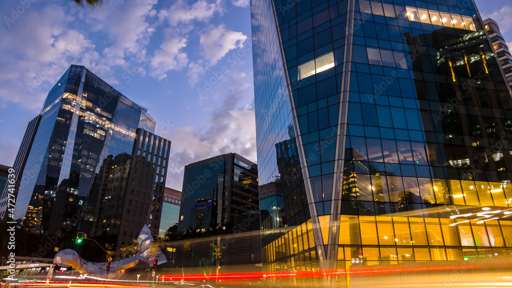 Obraz premium Modern office buildings on Faria Lima Avenue, during early evening in Sao Paulo city