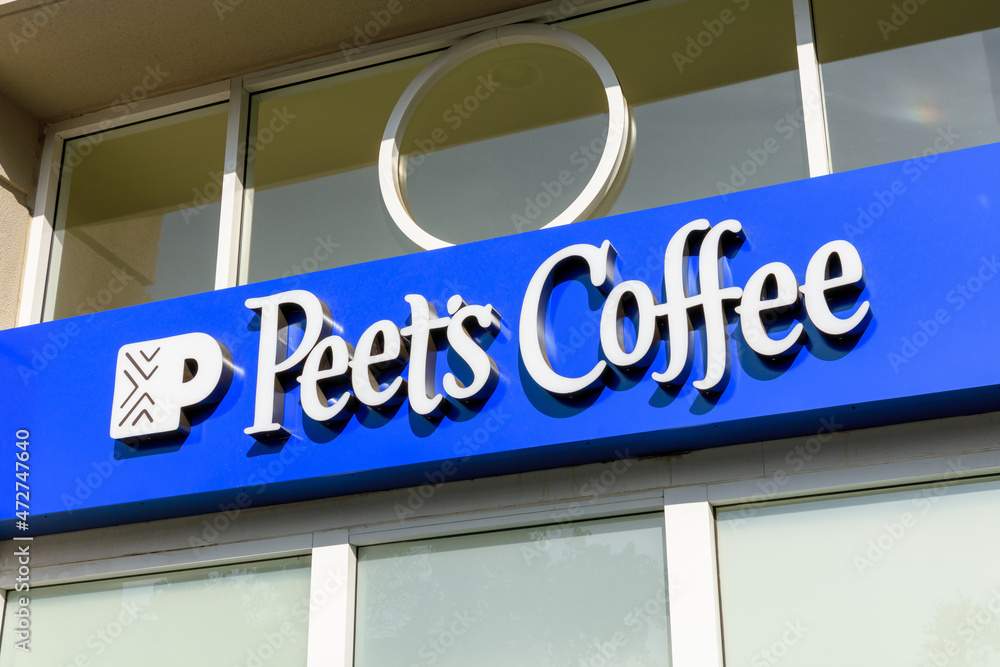 Peet's Coffee sign, logo at the entrance to specialty coffee roaster
