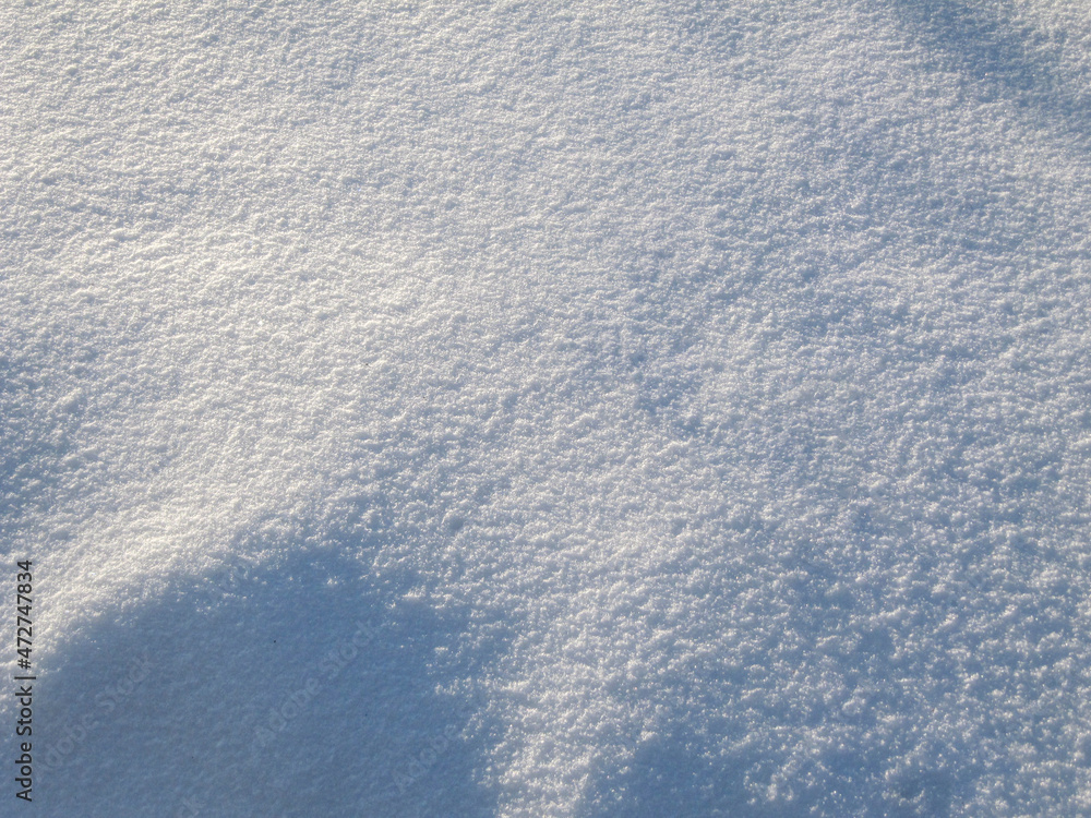 Shadows  and patterns on the surface  of snow