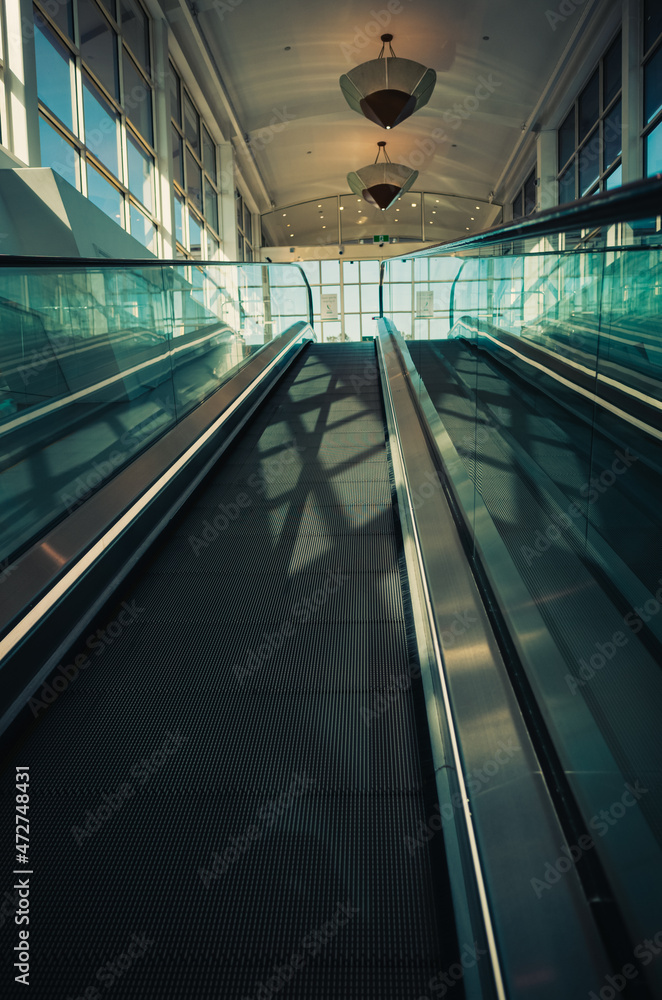 escalator in a building escalator in a building