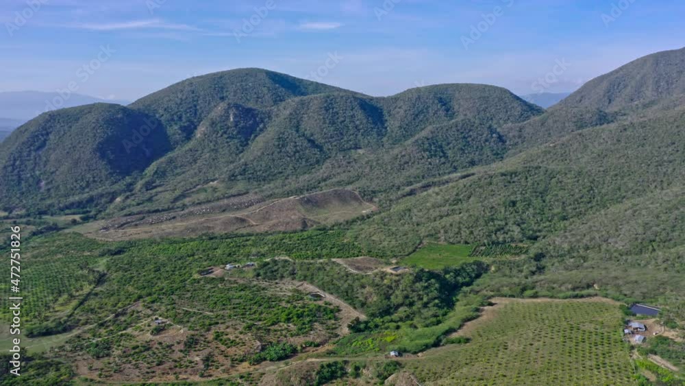 Lush Green Hills And Agriculture Landscape In Las Yayas de Viajama, Dominican Republic - aerial drone shot Lush Green Hills And Agriculture Landscape In Las Yayas de Viajama, Dominican Republic - aerial drone shot